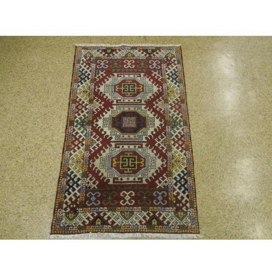 3 x 5 hand-knotted kazak wool rug, detail of pattern