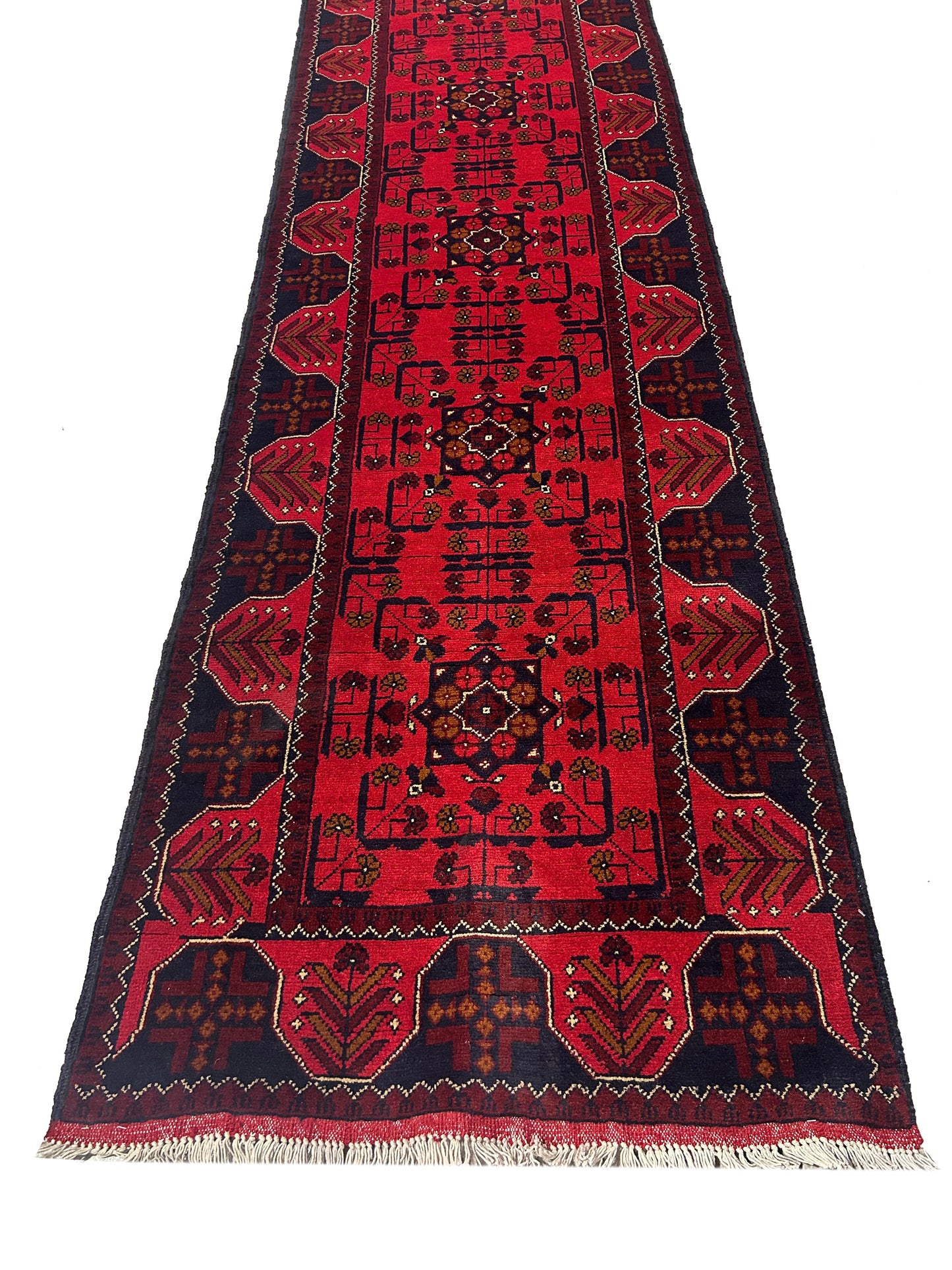 Afghan wool runner, repeating tribal medallion detail in deep red