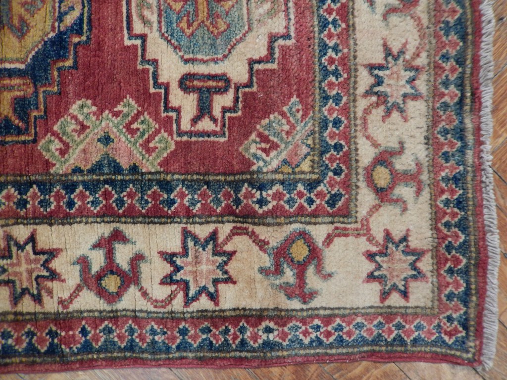 Kazak runner, end-finish and fringe close-up