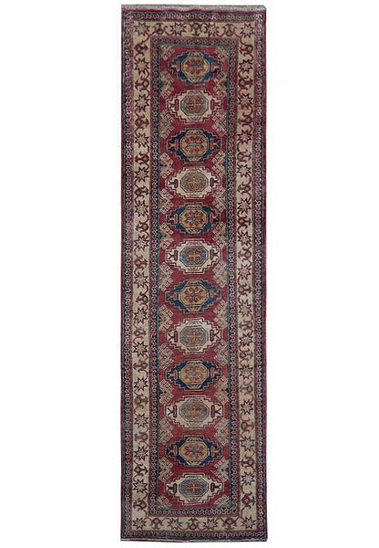 3 x 9 Kazak hand-knotted wool runner in multi-color tribal pattern, top view