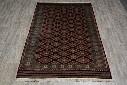 4.3 x 6.5 hand-knotted jaldar bokhara wool rug, corner detail