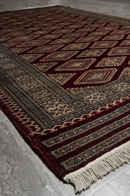 4.3 x 6.5 hand-knotted jaldar bokhara wool rug, alternate angle 1