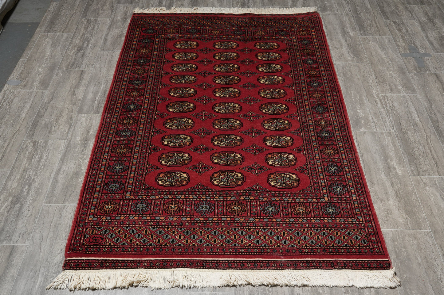 4 x 6.6 hand-knotted bokhara wool rug, corner detail