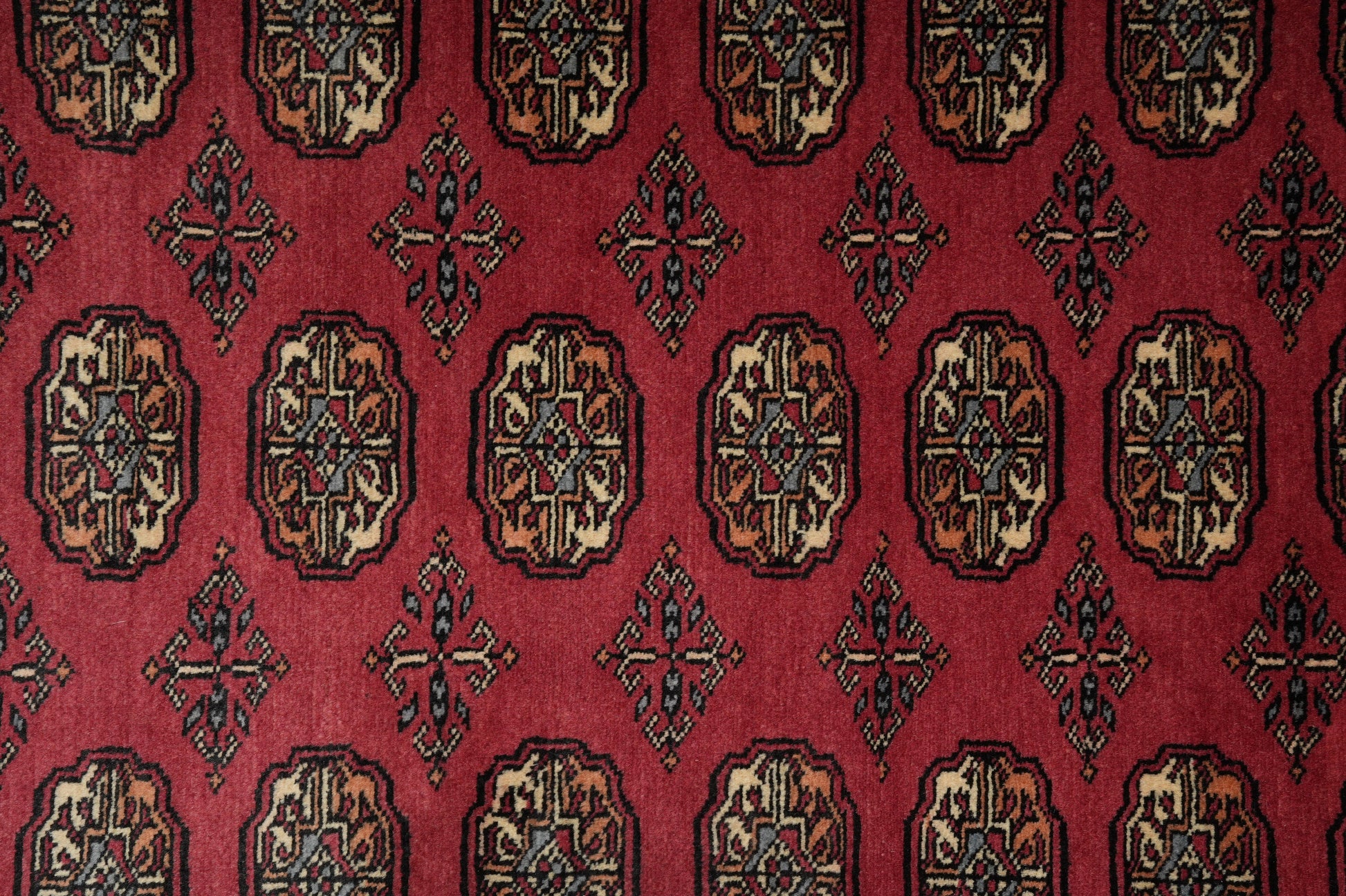 4 x 6.6 hand-knotted bokhara wool rug, alternate angle 1