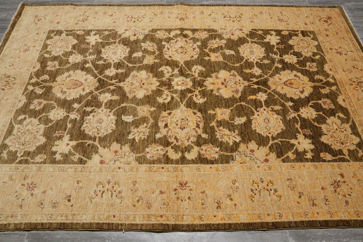 Chocolate brown Chobi rug, soft curvilinear detail