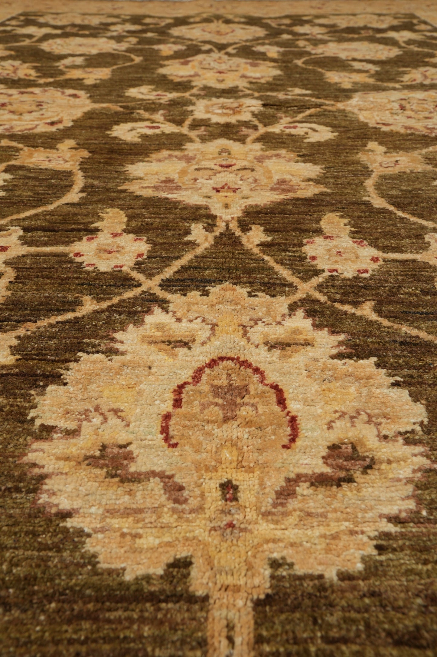 Chocolate brown Chobi rug, secondary motif detail