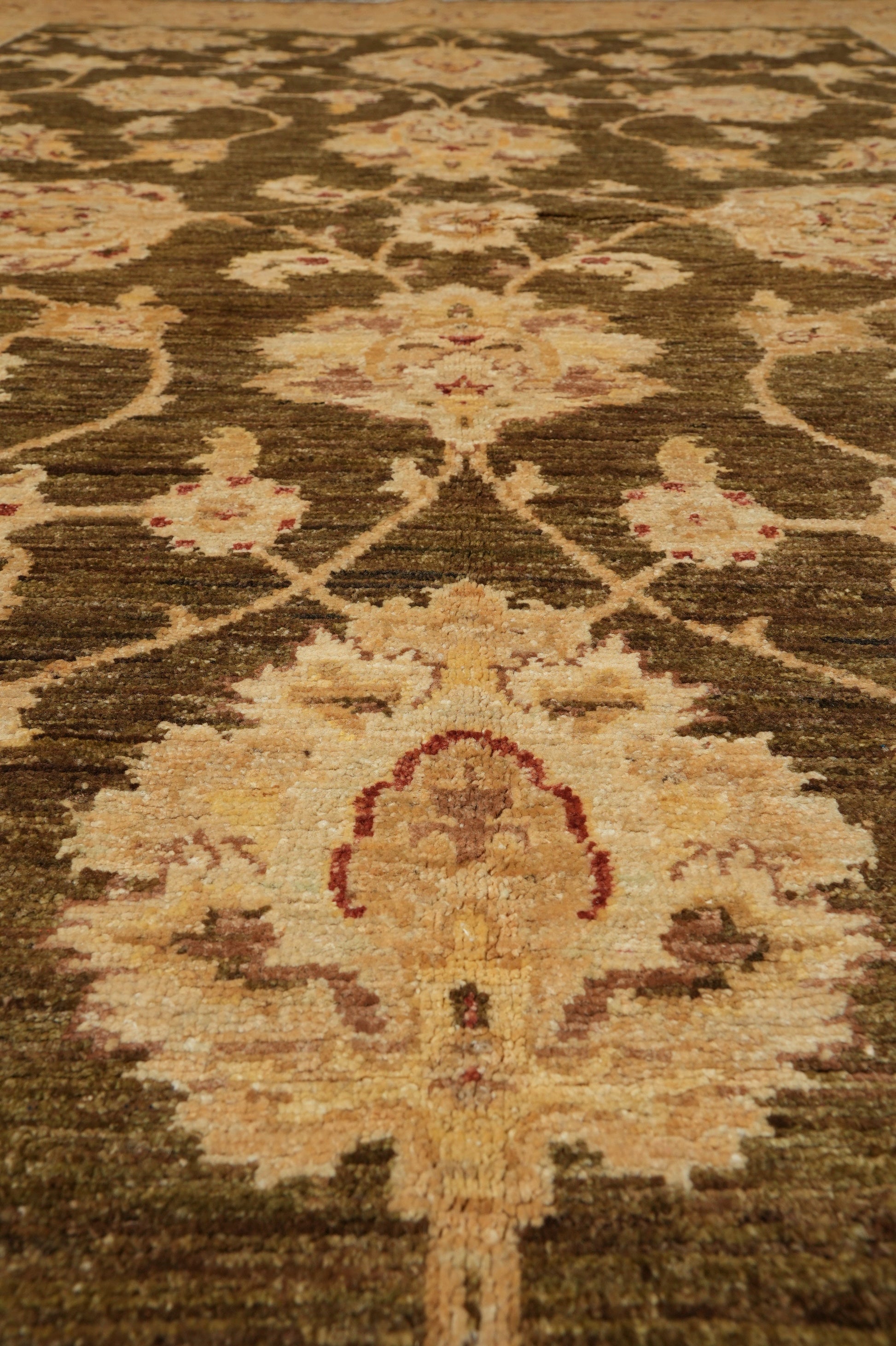 Chocolate brown Chobi rug, secondary motif detail
