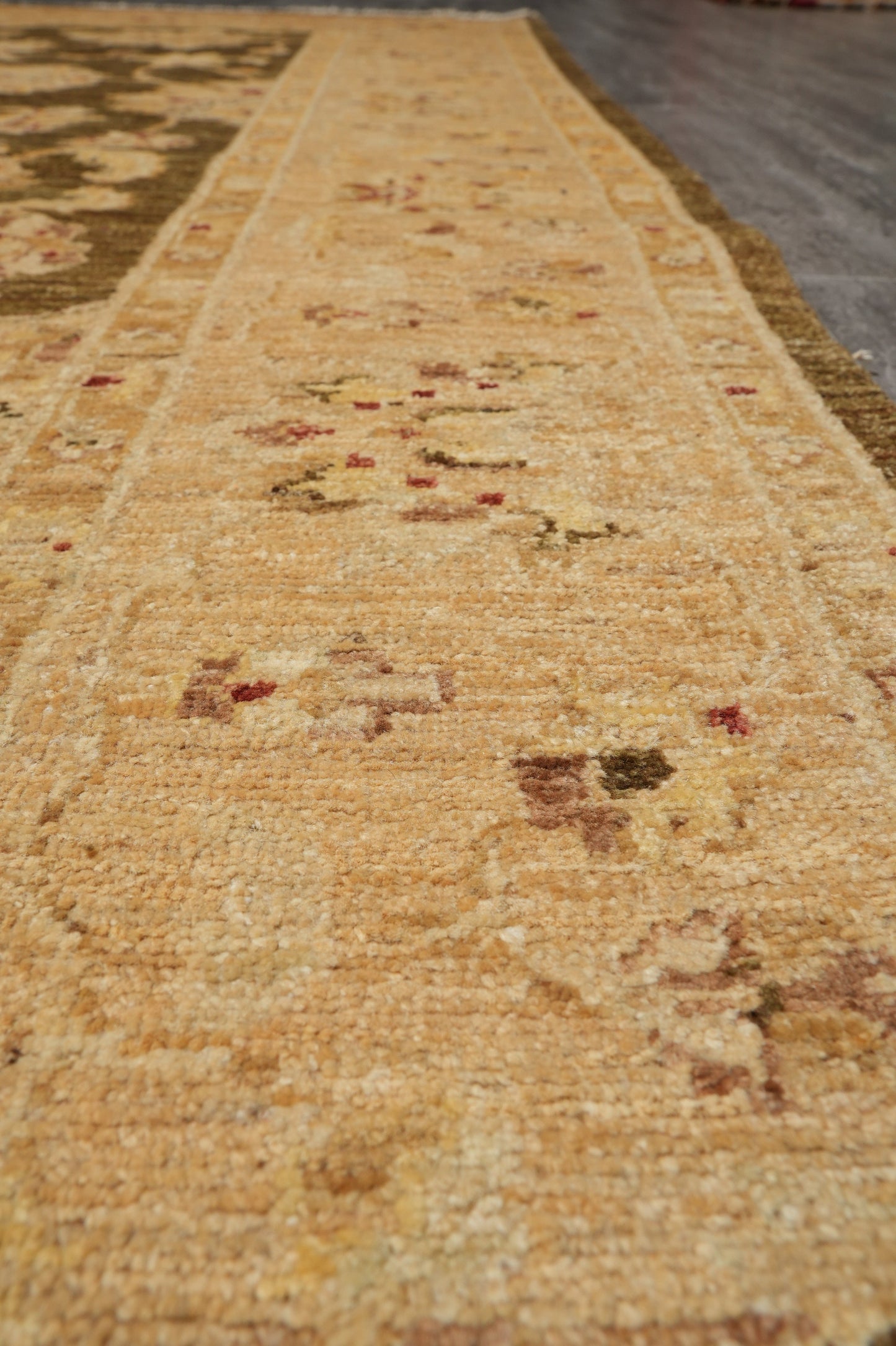 Chocolate brown Chobi rug, color balance close-up of chocolate field
