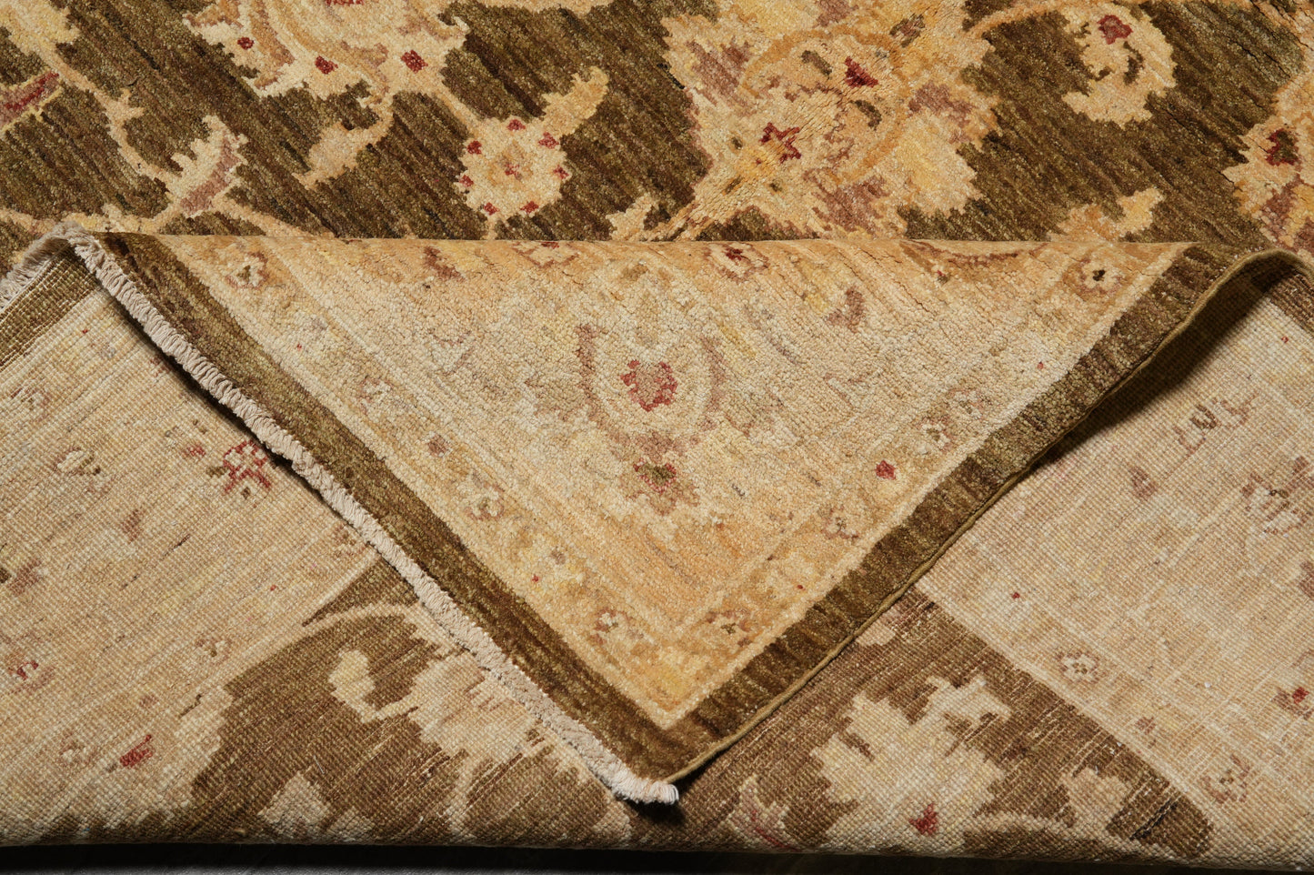 Chocolate brown Chobi rug, alternate corner with pattern continuity