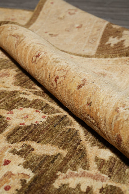 Chocolate brown Chobi rug, mid-field detail close-up