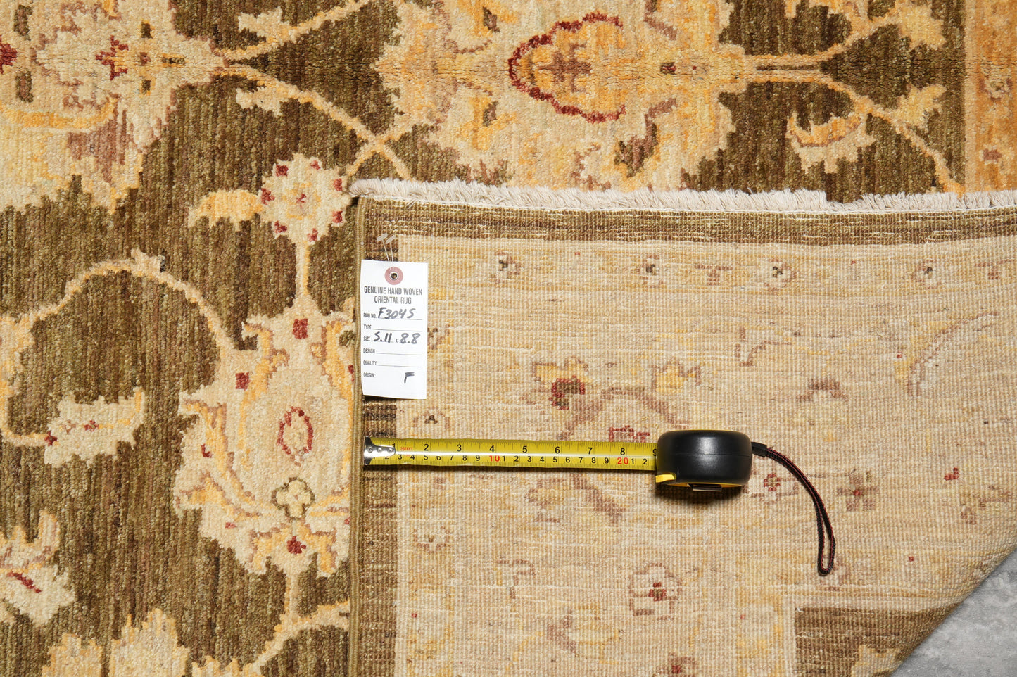 Chocolate brown Chobi rug, edge and selvedge close-up