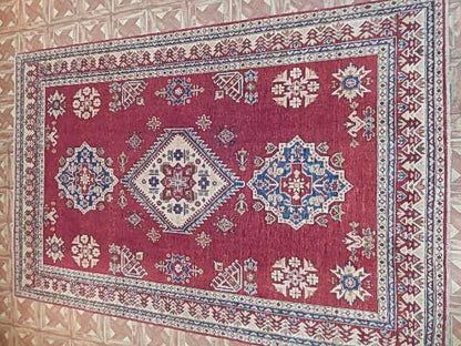 Afghan Kazak 6x8 rug, tribal motif detail