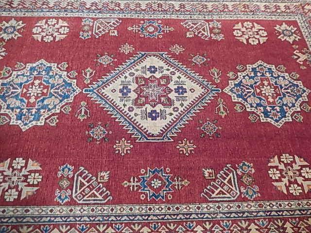 Afghan Kazak 6x8 rug, corner motif with tribal geometry