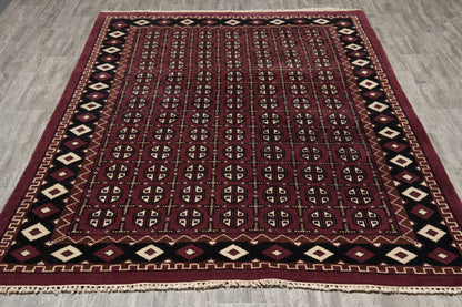Turkman Bokhara burgundy rug, repeating motif detail