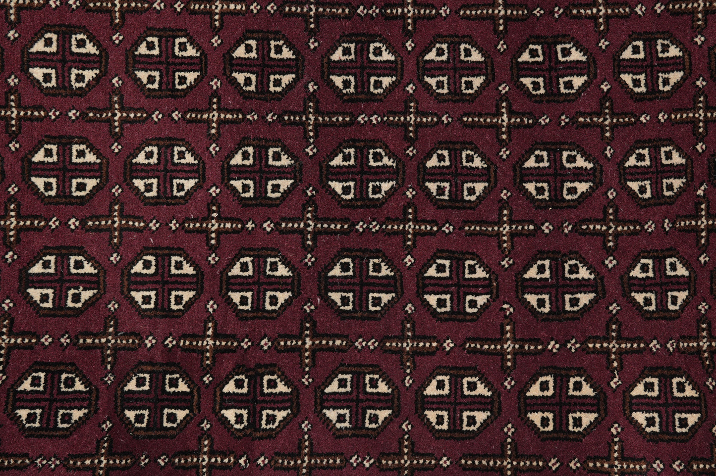 Turkman Bokhara burgundy rug, alternate medallion detail