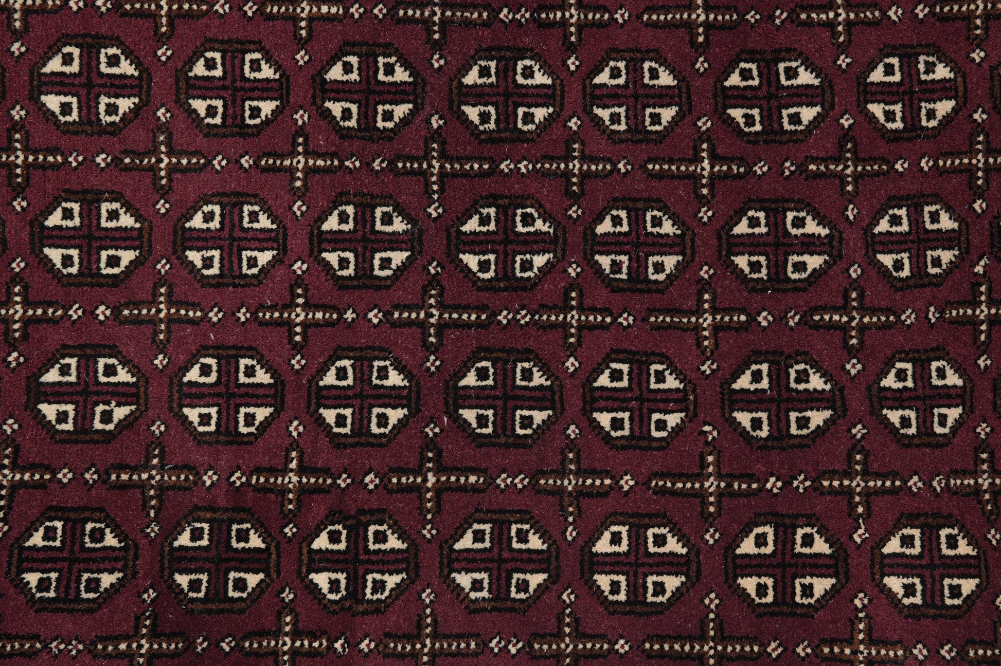Turkman Bokhara burgundy rug, alternate medallion detail