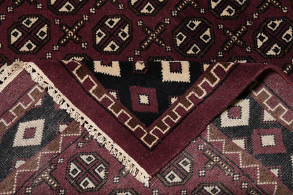 Turkman Bokhara burgundy rug, mid-field detail showing color depth