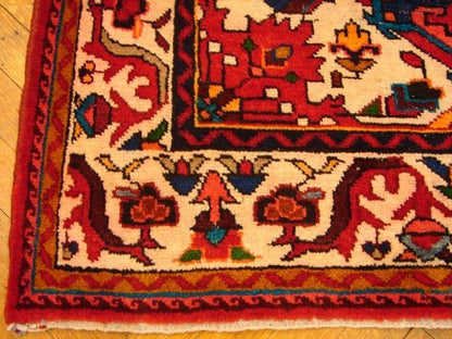 Hamadan-style runner, pile texture close-up showing wool depth