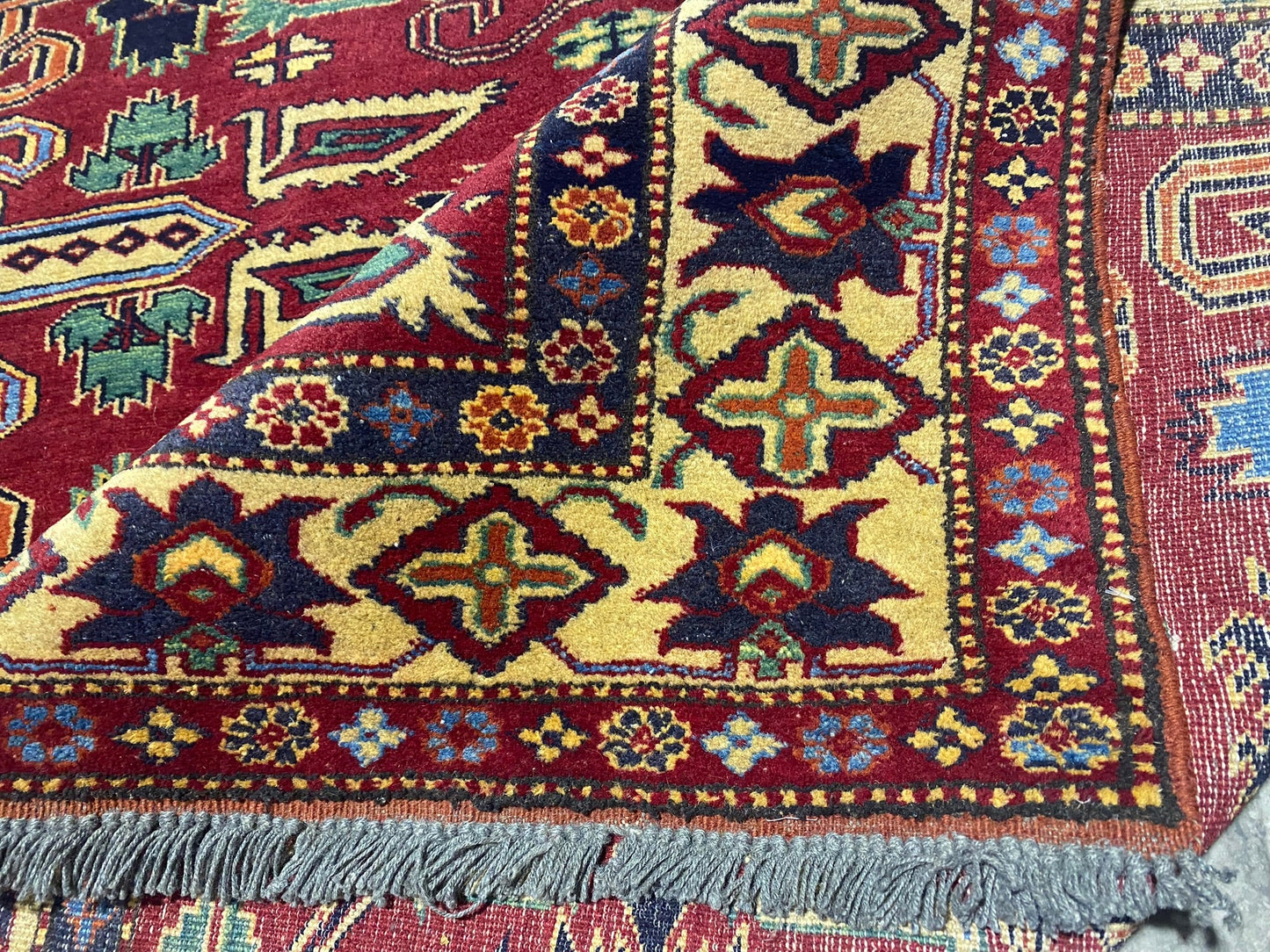 Afghan Kazak small rug, border pattern in ivory and red