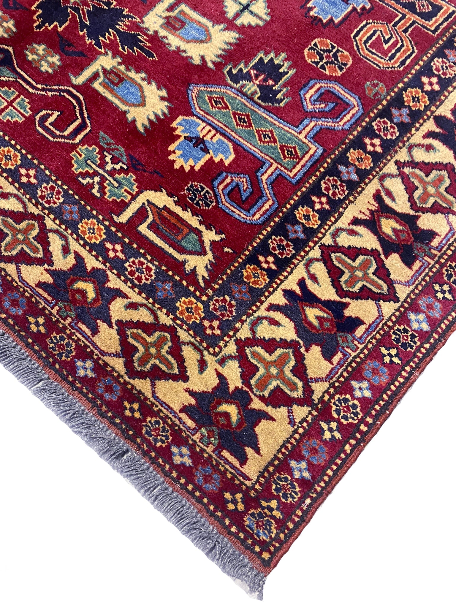 Afghan Kazak small rug, corner motif with bold tribal geometry