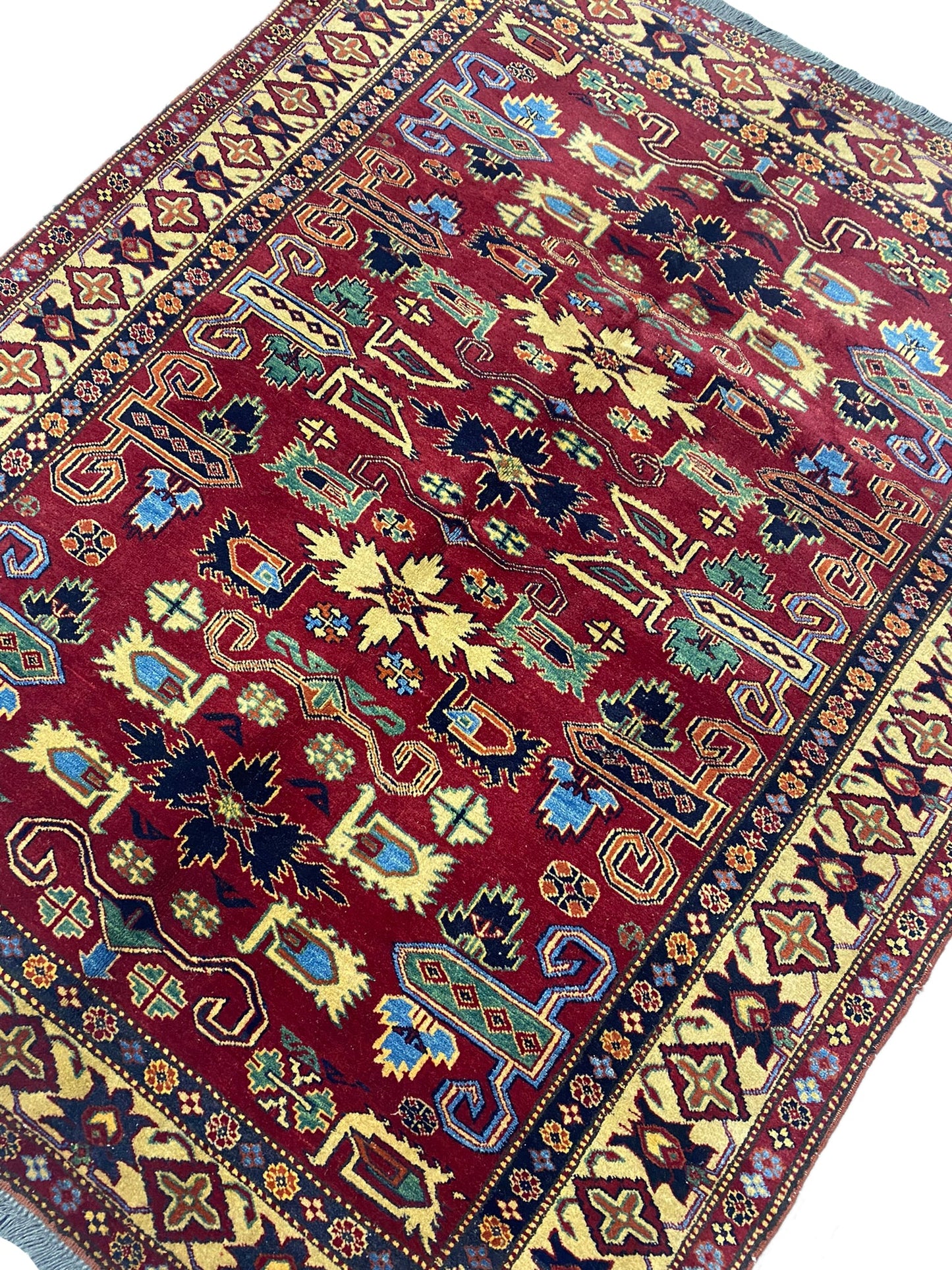 Afghan Kazak small rug, secondary medallion detail