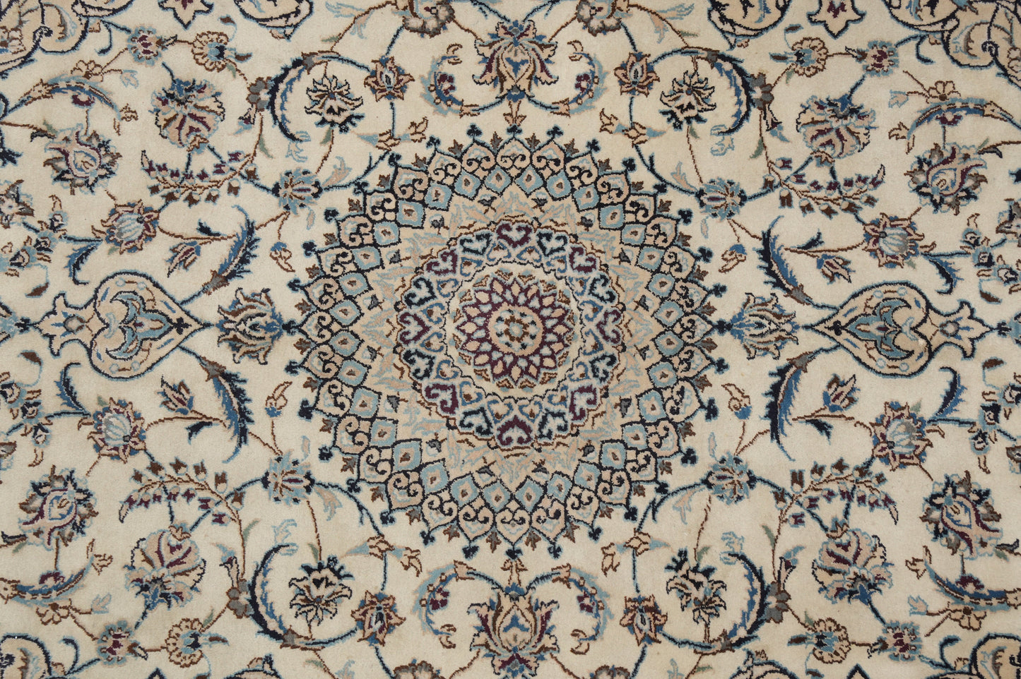 Tabriz-style ivory rug, corner motif close-up