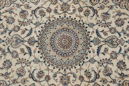 Tabriz-style ivory rug, corner motif close-up