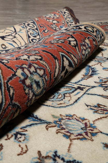 Tabriz-style ivory rug, mid-field detail