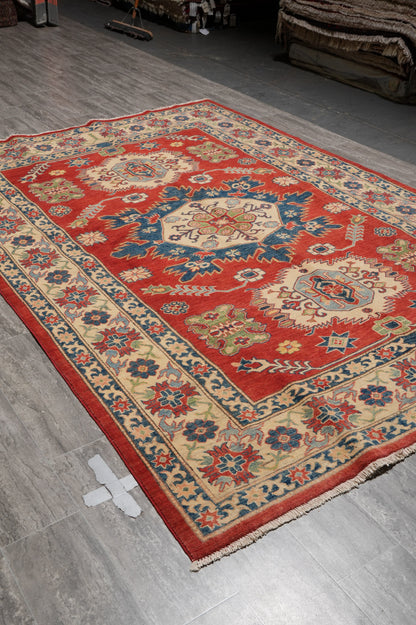 Afghan Kazak rug, corner motif with bold geometry