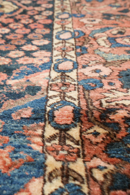 Bakhtiar-pattern garden rug, corner motif and panel intersection