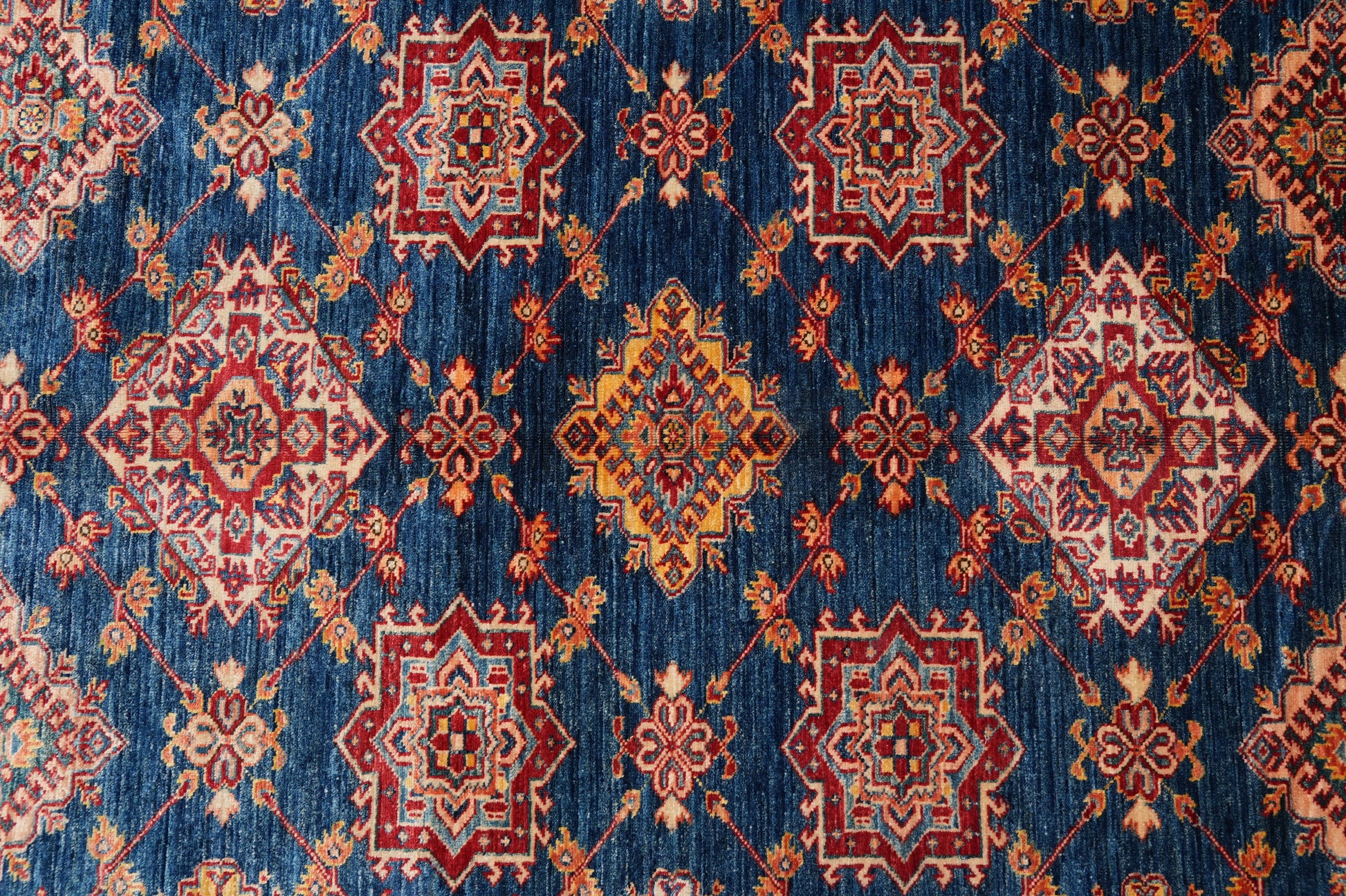 Silky navy Super Kazak rug, pile texture showing silky wool finish