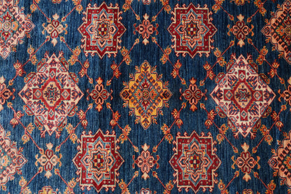 Silky navy Super Kazak rug, pile texture showing silky wool finish