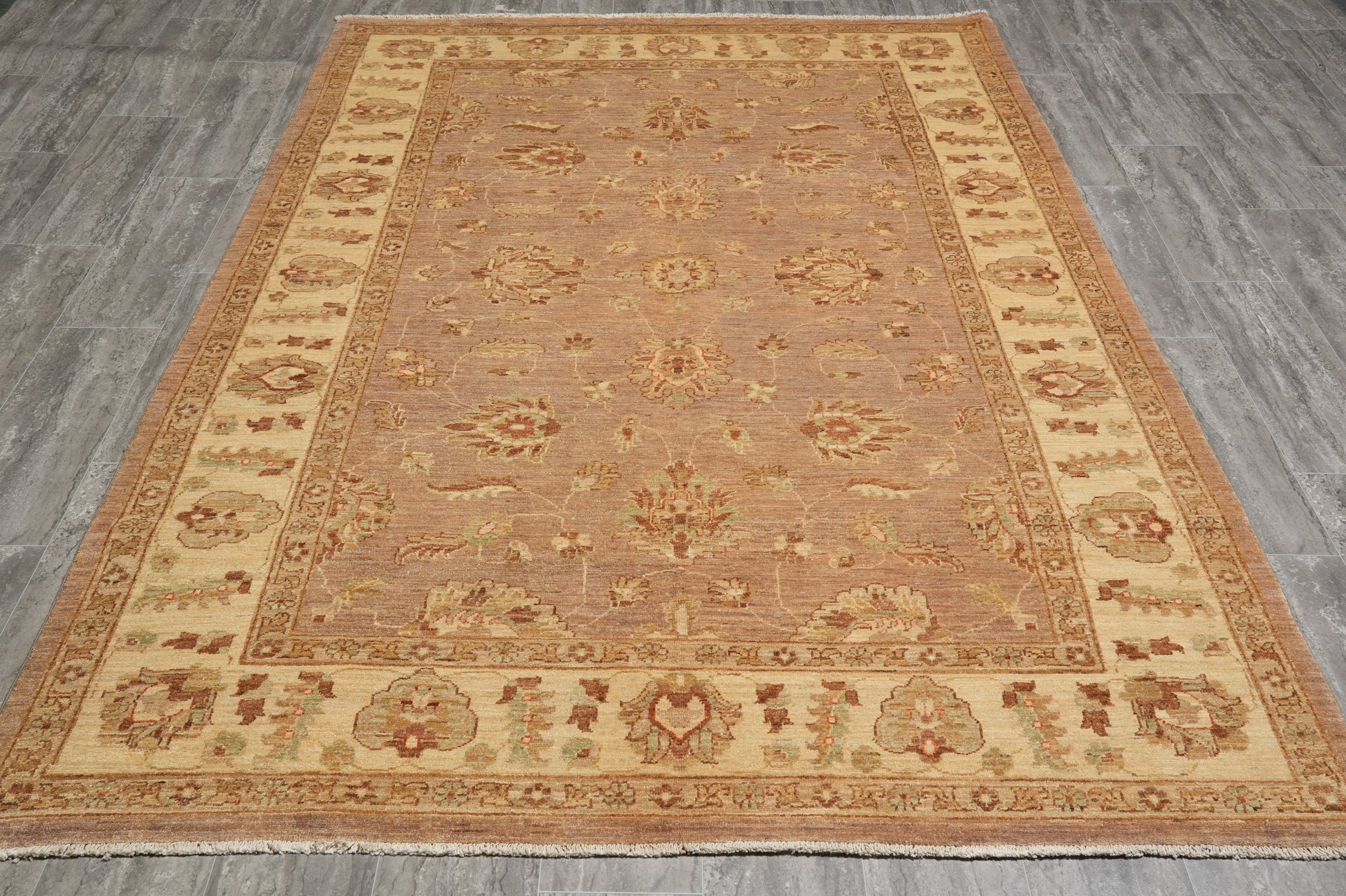 Chobi Peshawar tan rug, ivory border close-up