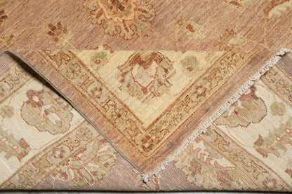 Chobi Peshawar tan rug, mid-field detail