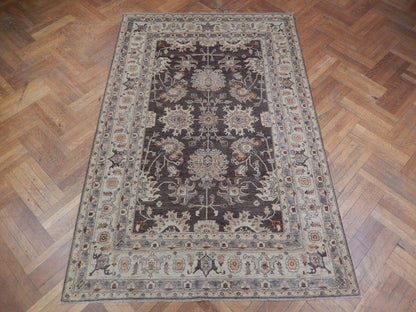 Chobi Peshawar rug, central motif close-up showing vegetal-dye depth