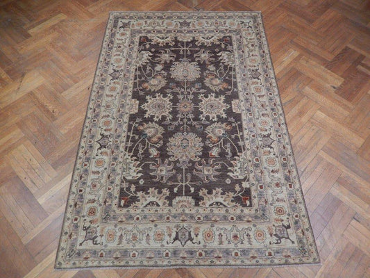 Chobi Peshawar rug, central motif close-up showing vegetal-dye depth