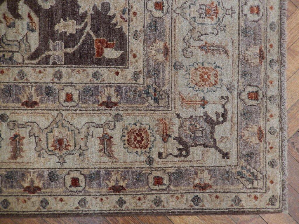Chobi Peshawar rug, color balance close-up showing earth-tone palette
