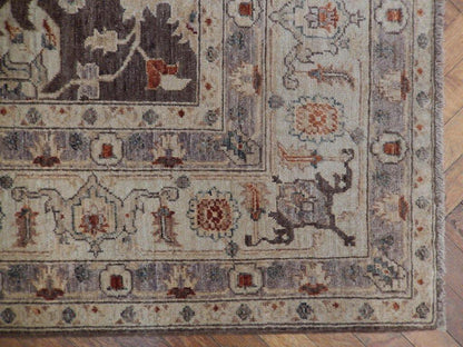 Chobi Peshawar rug, color balance close-up showing earth-tone palette