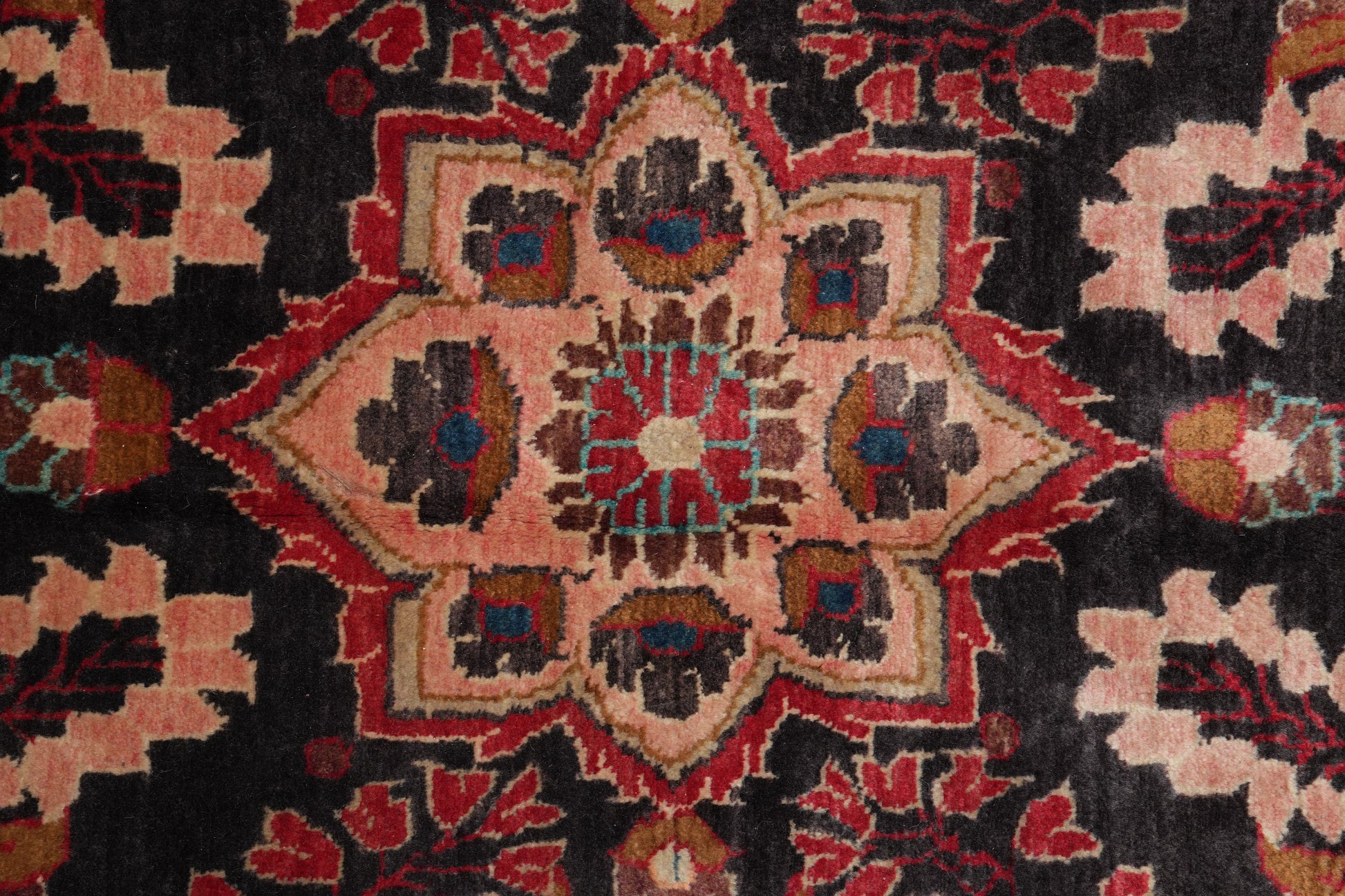 Semi-antique traditional floral rug, secondary floral cluster close-up