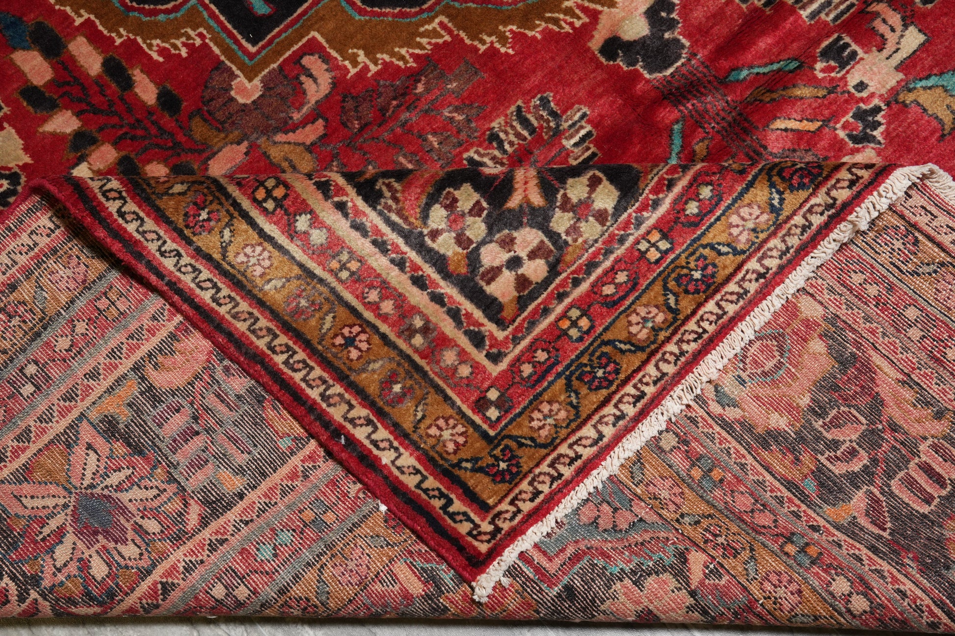 Semi-antique traditional floral rug, third floral motif close-up