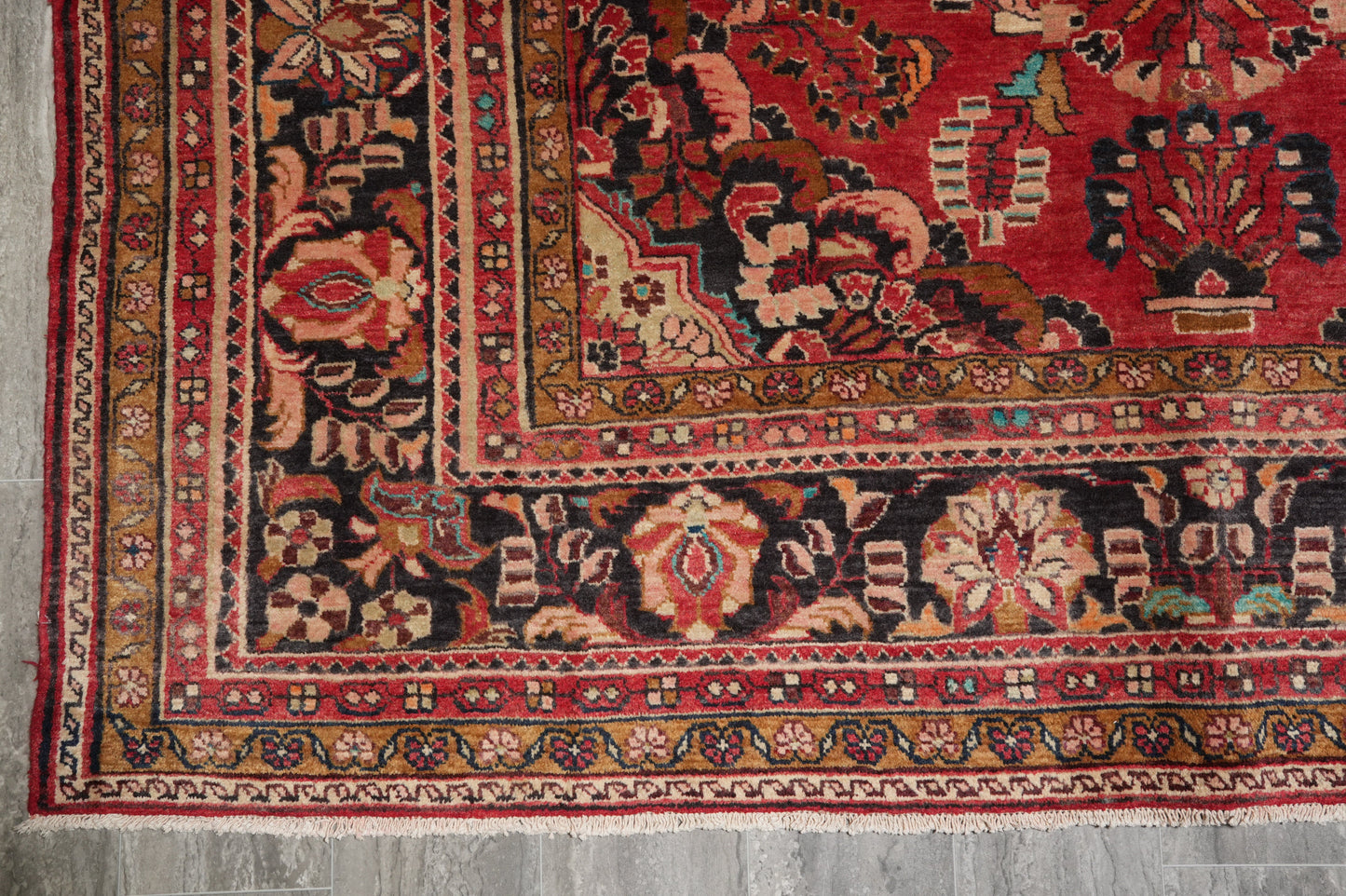 Semi-antique traditional floral rug, fourth floral cluster close-up