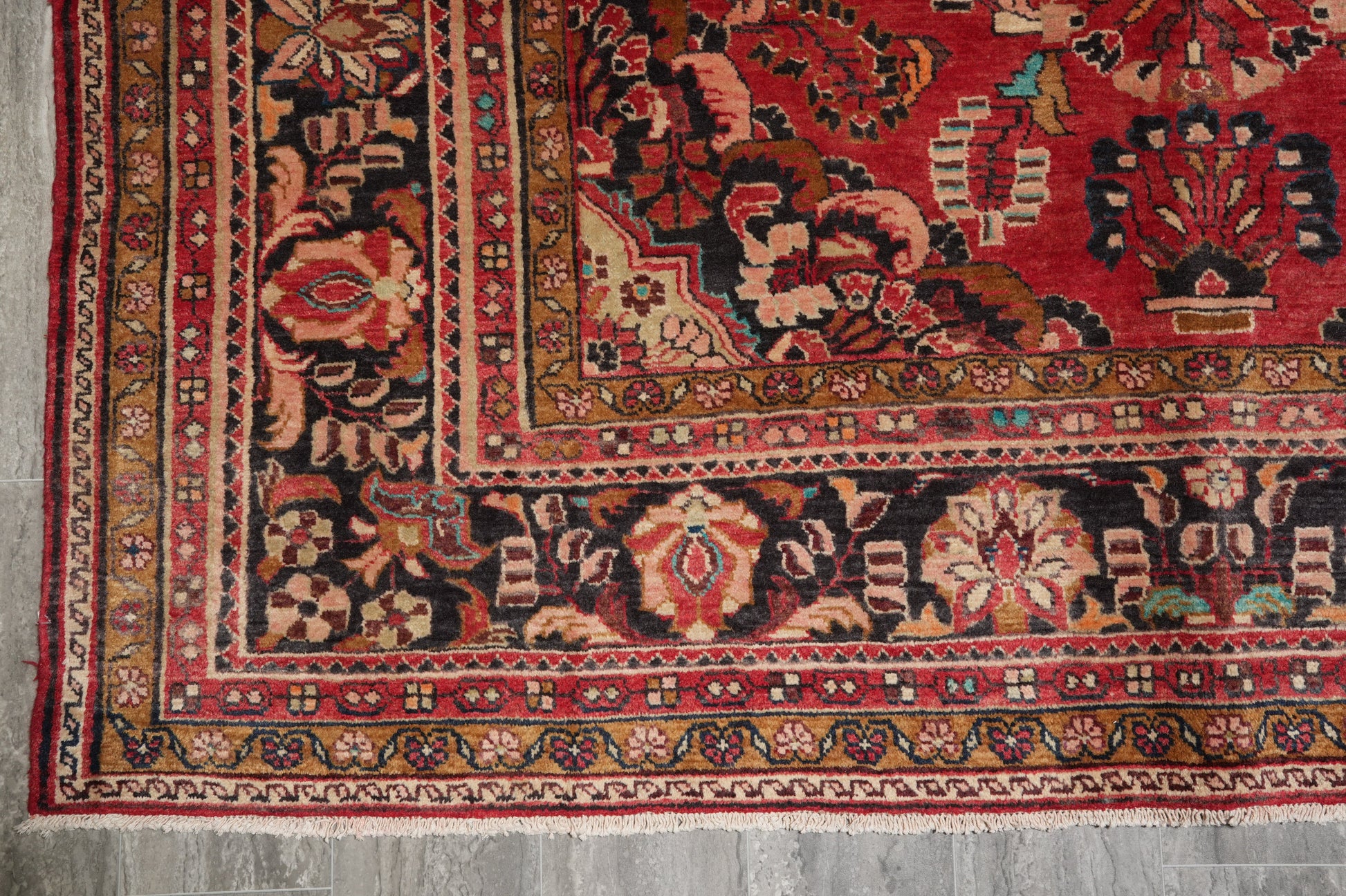 Semi-antique traditional floral rug, fourth floral cluster close-up