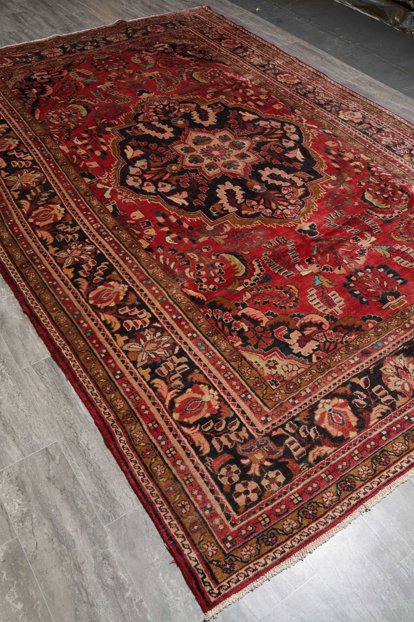 Semi-antique traditional floral rug, pile texture showing aged wool patina