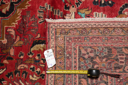 Semi-antique traditional floral rug, edge and selvedge close-up