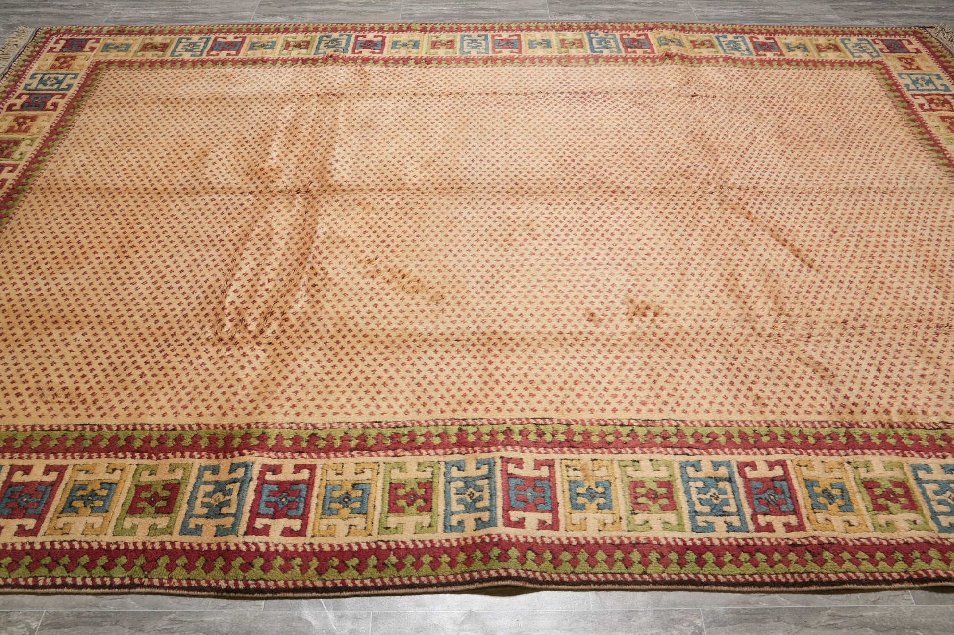 Saraband-pattern rug, tribal corner detail in ivory and navy