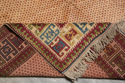 Saraband-pattern rug, mid-field boteh continuity