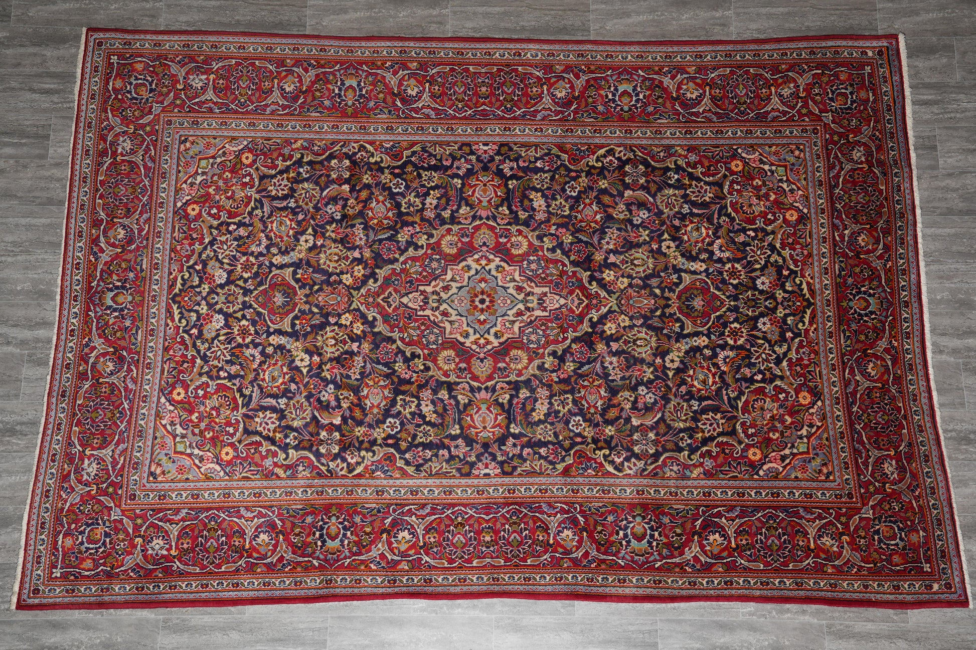 Kashan-style navy rug, alternate top view showing the medallion in proportion