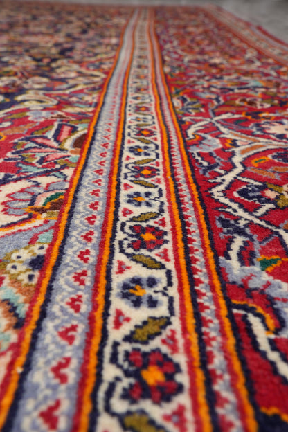 Kashan-style navy rug, corner motif with floral arabesques