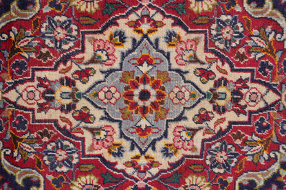 Kashan-style navy rug, secondary border pattern detail