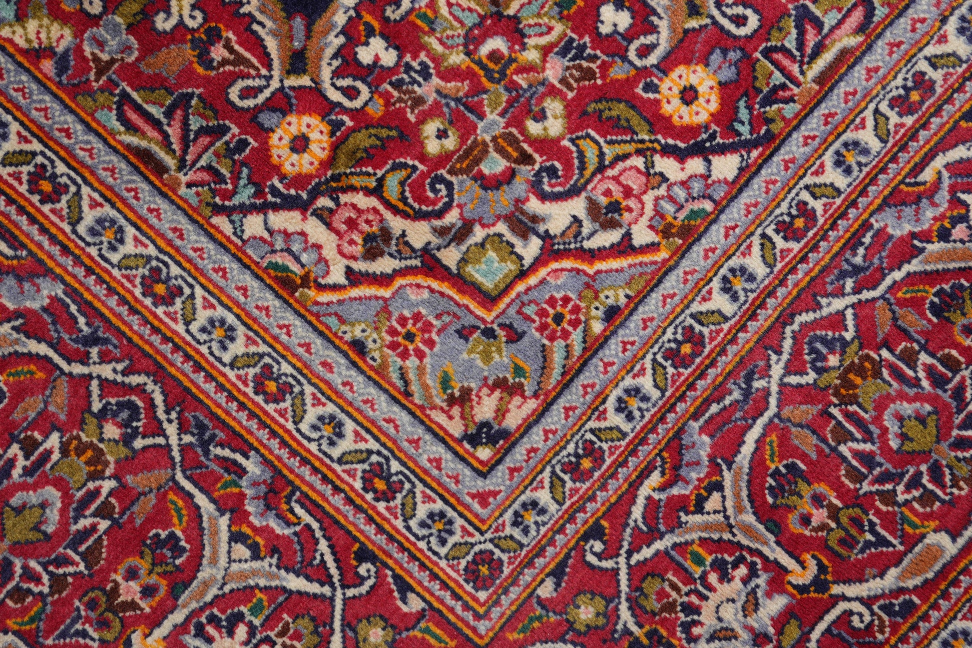 Kashan-style navy rug, pile texture detail showing dense wool